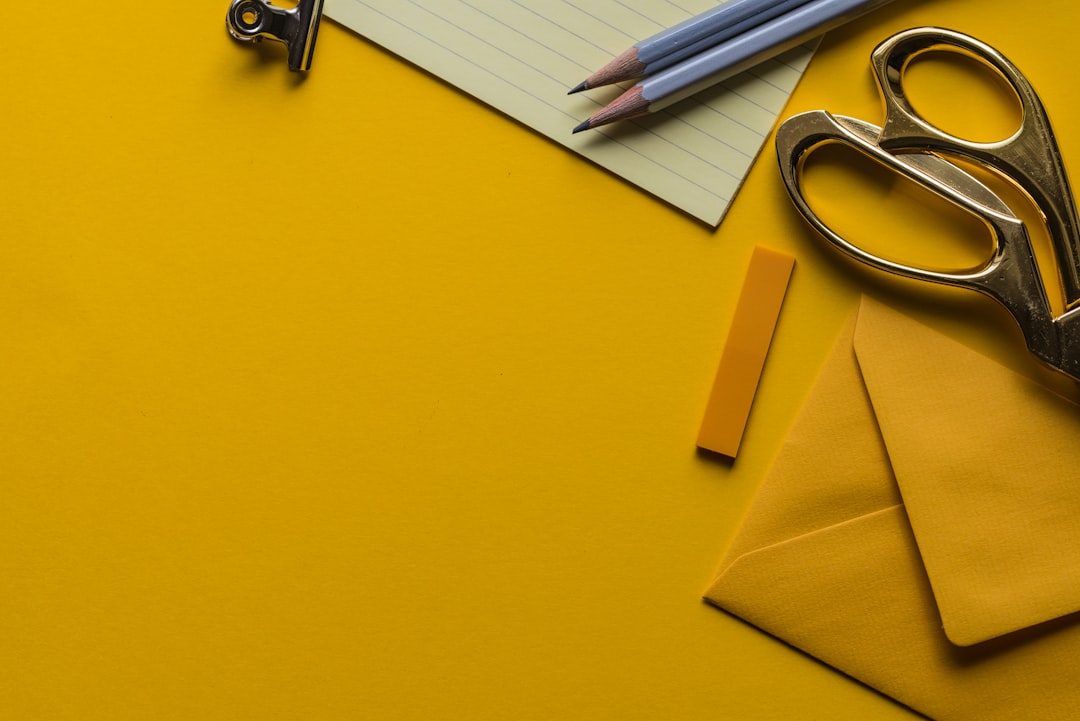 gray-scissor-with-envelope-and-pencils-bf2vsubyhcq